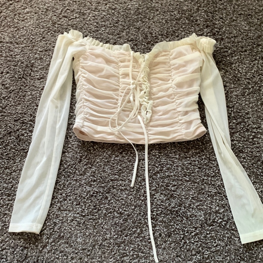 Tiger most white ruffle top